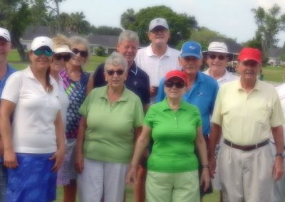 Group picture of golfer golfing at the 2019 Golf Scramble hosted by Swiss American Club